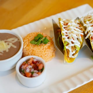(L) Taco-Riendo